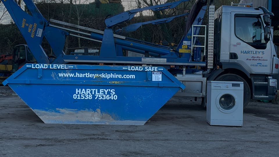 ten tonne large skip next to washing machine to compare skip size