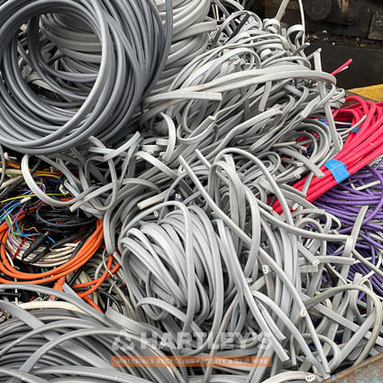 Scrap Electric Cables Multiple types of scrap electric cables in a scrap yard
