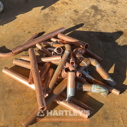 Scrap Metal Copper Pipes Scrap Metal Copper Pipes in a pile being weighed